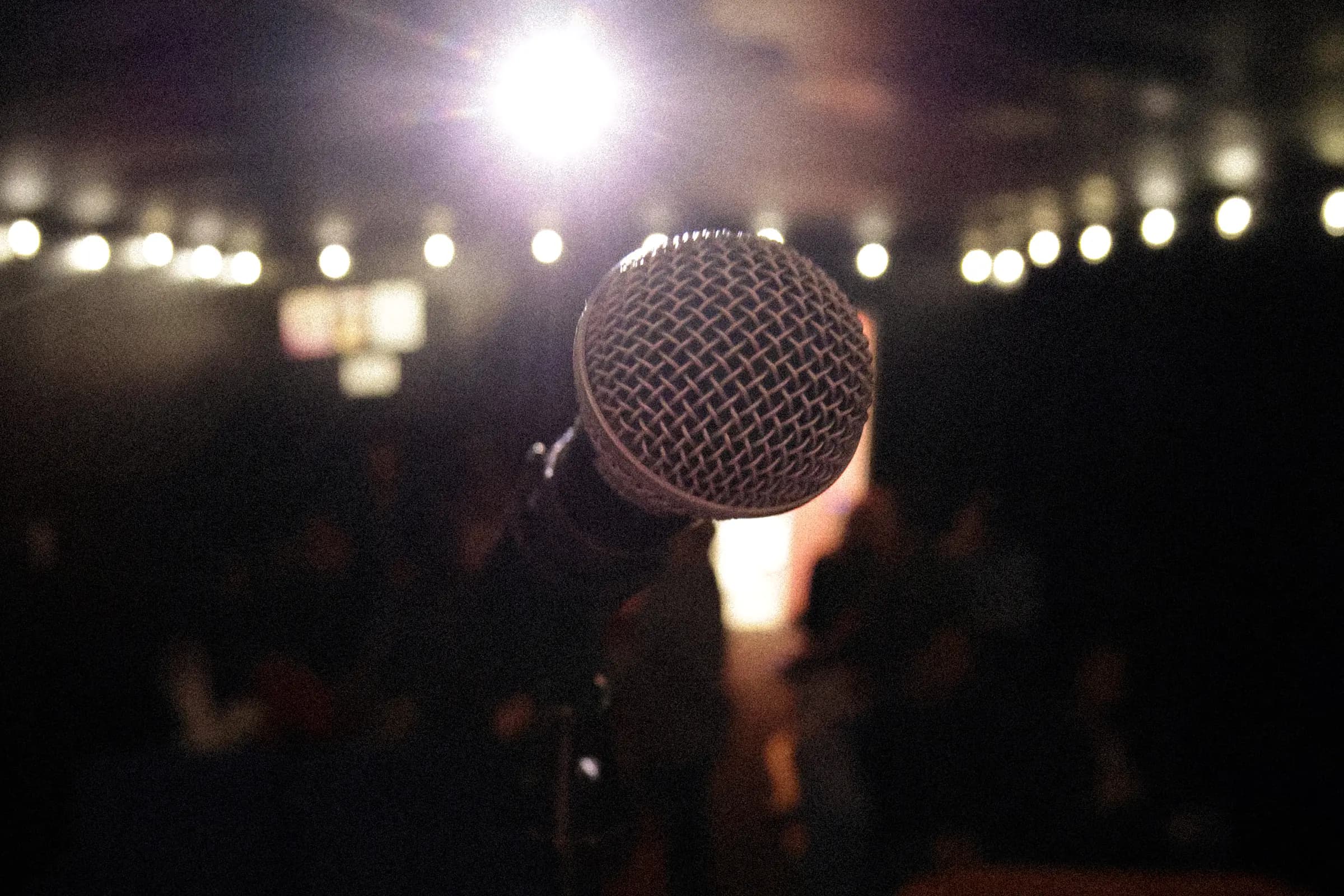 Intimate audience laughing during a show at Badger Comedy