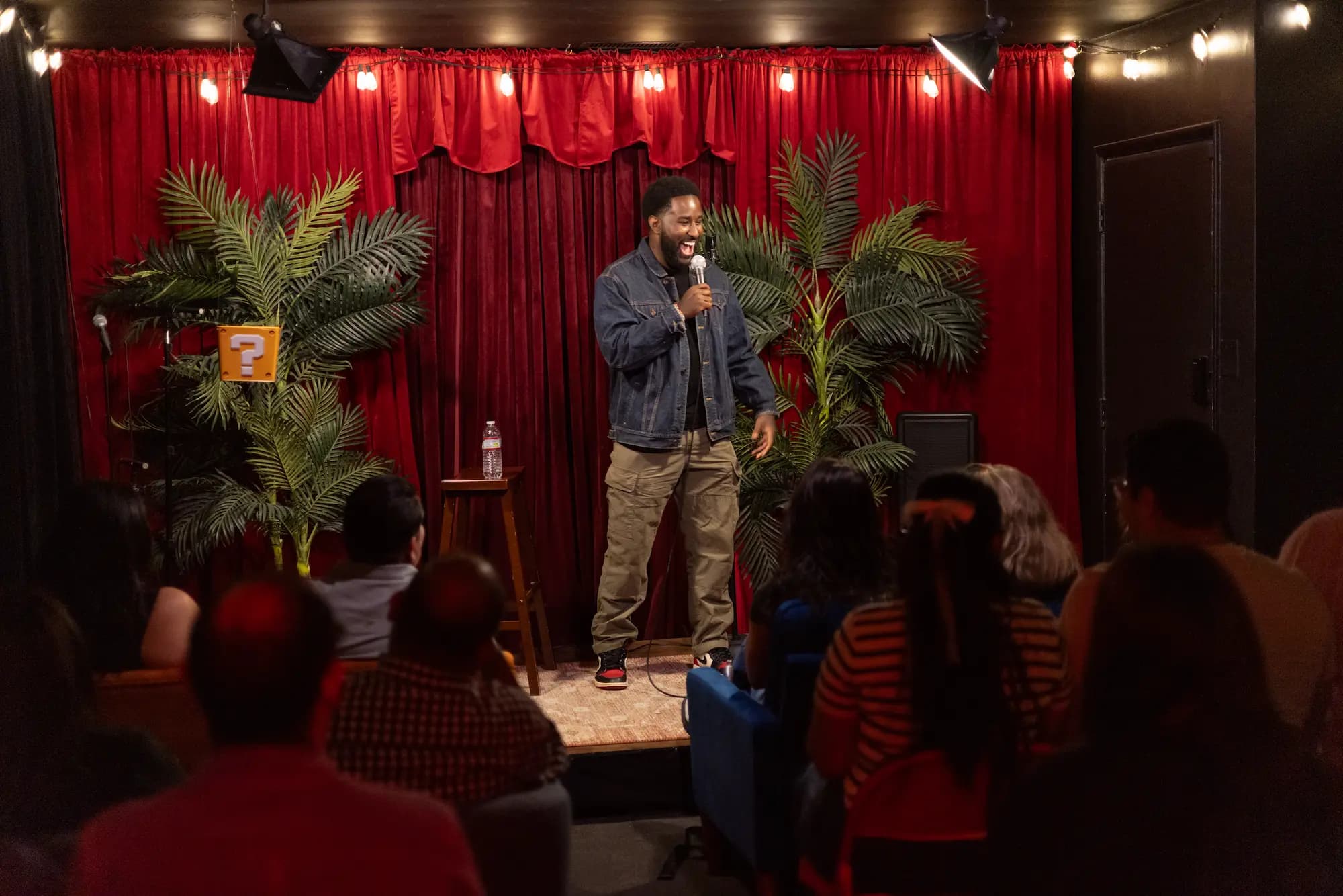 Herb performing standup at Badger Comedy